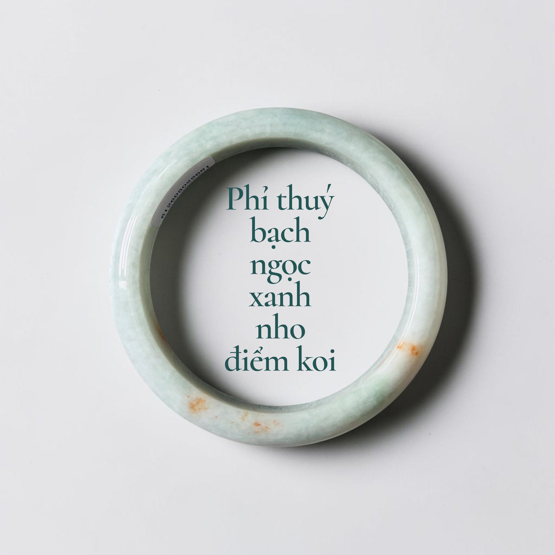 Phỉ thuý bạch ngọc xanh nho điểm koi ni 57 - White jadeite with grape green tones and koi-like accents 57mm