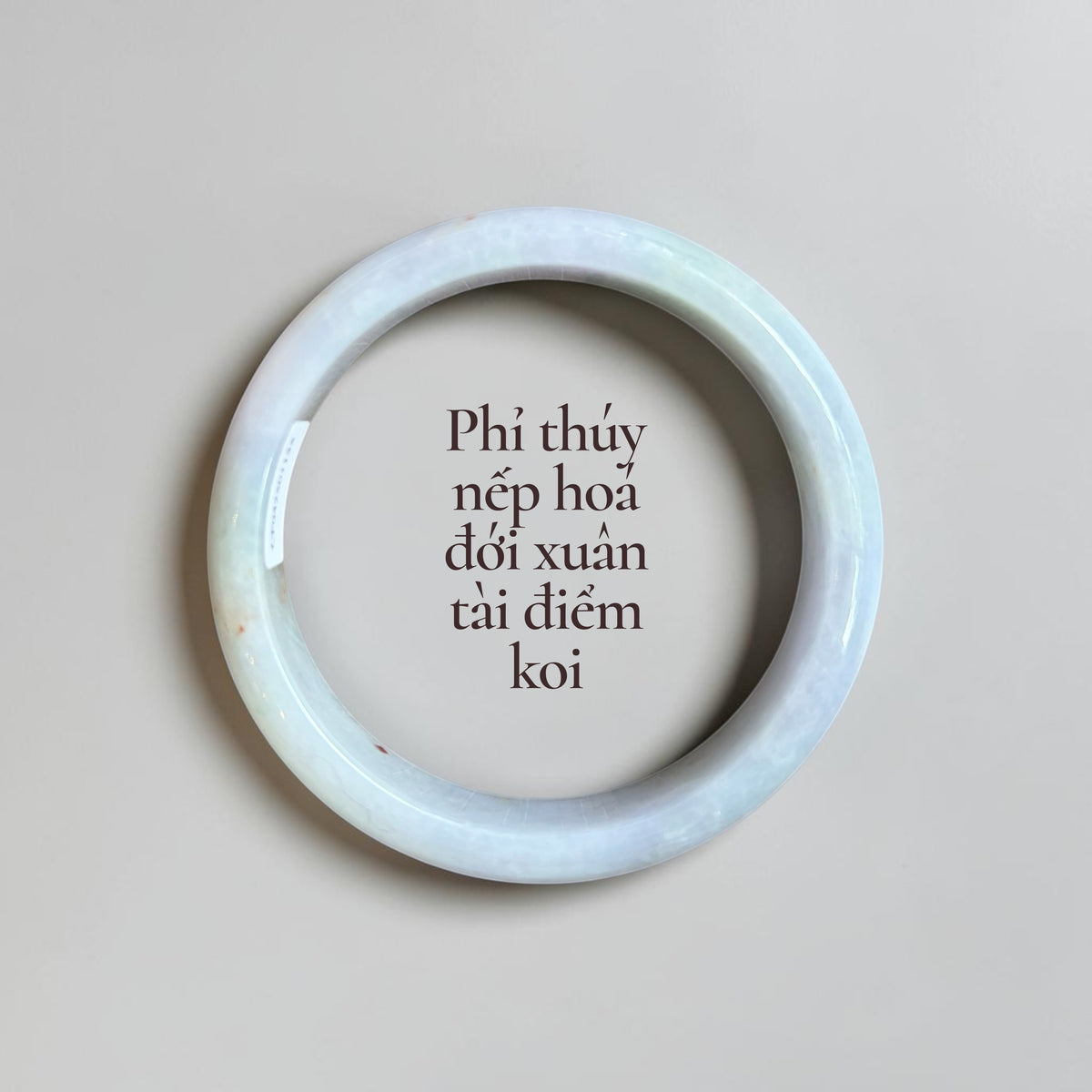 Translucent jadeite with a spring-green band and delicate koi - Phỉ thúy nếp hoá đới xuân tài điểm koi
