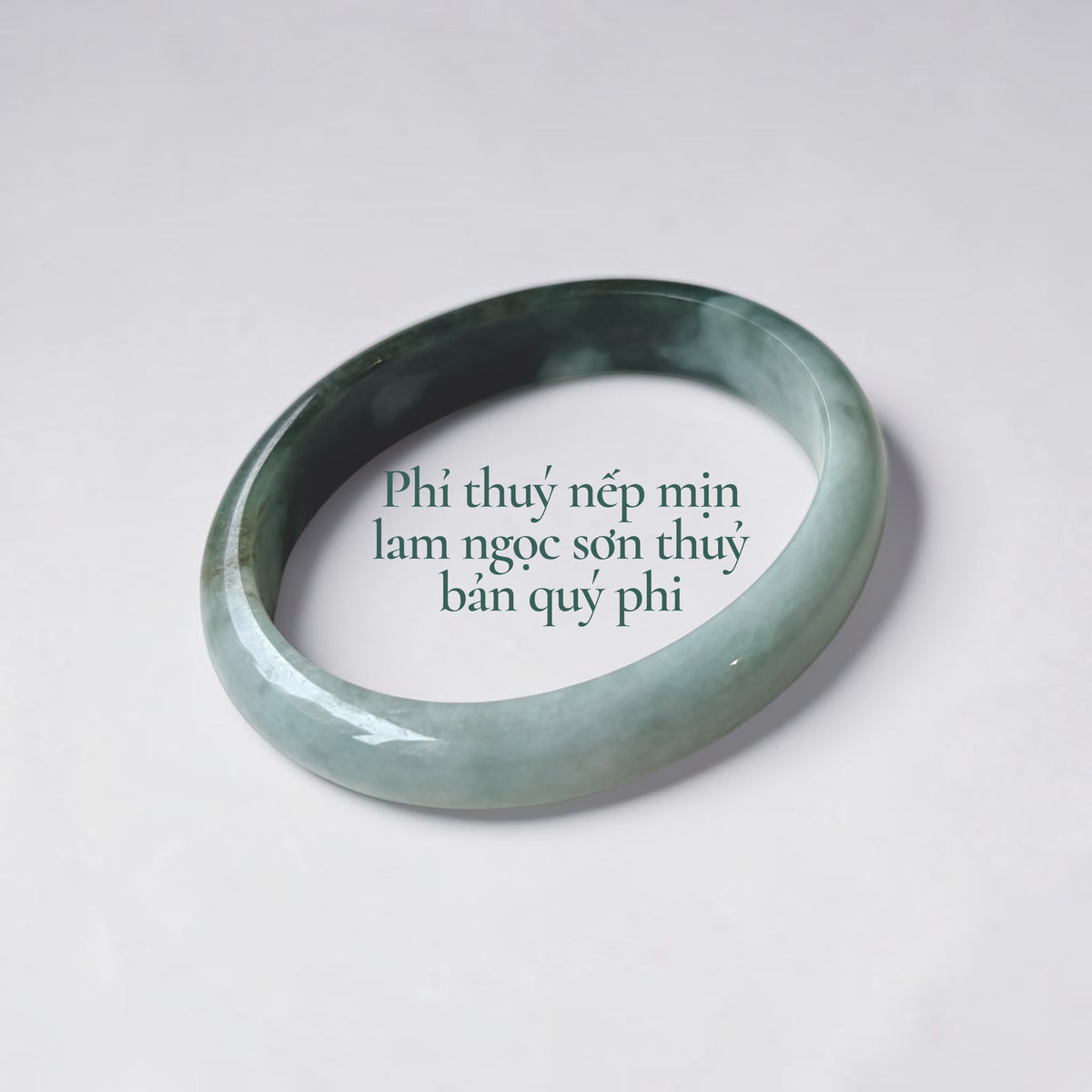 Fine-textured jadeite with “half mountain, half water” coloring and soft moss-green hues, in a Princess-style bangle - Phỉ thuý nếp mịn bán sơn bán thuỷ phớt rêu bản quý phi