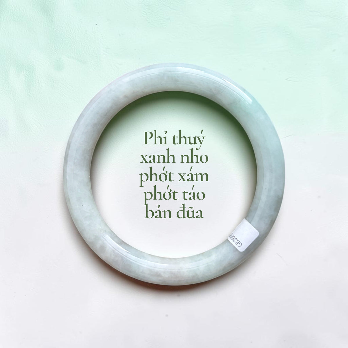 Grape-green jadeite with soft gray and apple-green hues, in a flat baton-style bangle - Phỉ thúy xanh nho phớt xám phớt táo bản đũa