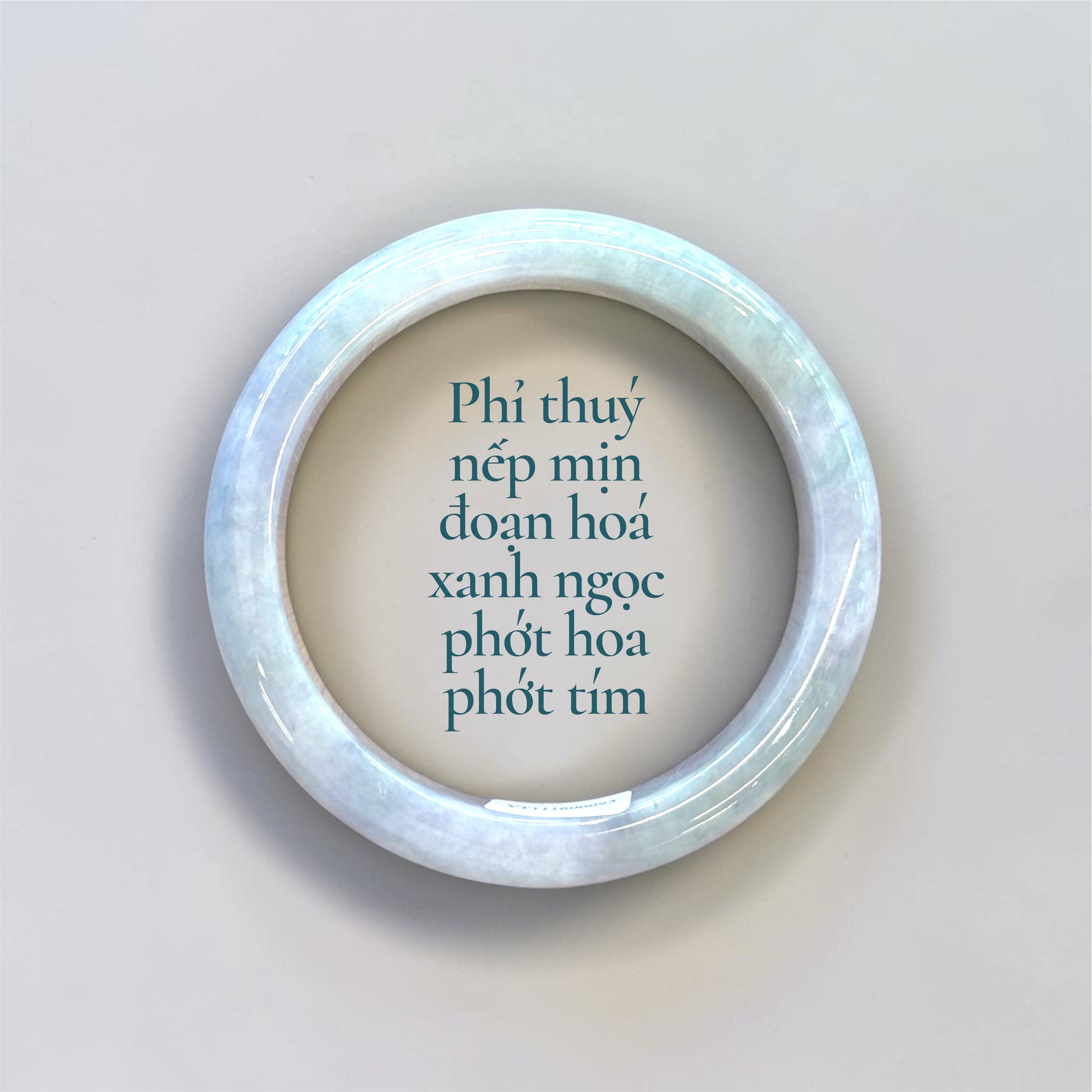 Phỉ thuý nếp mịn đoạn hóa xanh ngọc phớt hoa phớt tím - Ni 57 - Fine-grain jadeite with soft green transformation, lightly touched with floral lavender tones size 57mm