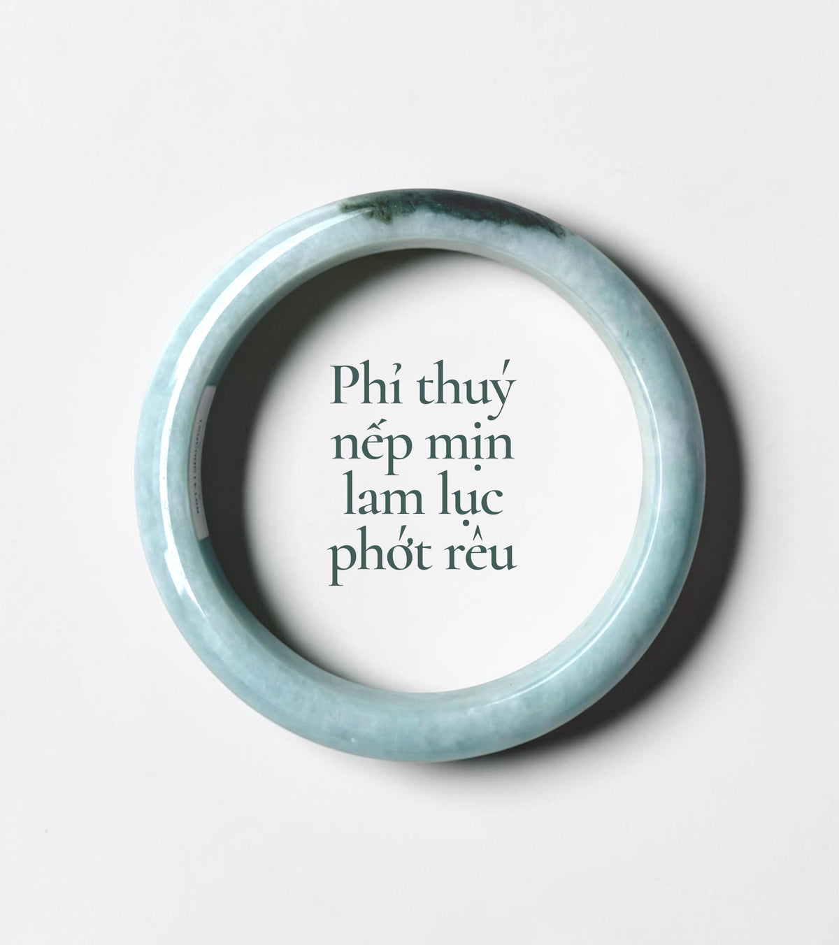 Fine-textured blue-green jadeite with soft moss-green undertones - Phỉ thuý nếp mịn lam lục phớt rêu